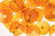 © ADDICTIVE STOCK - Apple slice background in warm orange tones, flat lay