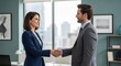 © ratna - Business partners shaking hands in a modern city office