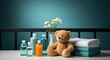© AFFANYUDA - Baby bath products with teddy bear and towels on a table.