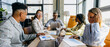 © Kostiantyn - Senior executives engage in strategic dialogue with diverse viewpoints