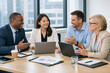 © Kymaka28 - Confident diverse business team discussing strategy in modern bright office, laptops, teamwork, professional atmosphere, realistic corporate stock photo, high detail