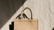 © Pawel - Classic beige jute tote bag with handles studio lighting