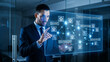 © Frame Stocks - A man interacting with a futuristic, transparent display, representing technological innovation and data analysis