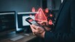 © Mayla - Cybersecurity threat warning on smartphone with red alert icon signaling hacking attempt, virus infiltration, and data breach while user checks phone at home