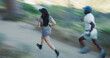 © peopleimages.com - Speed, running and couple with motion blur outdoor for fitness, cardio wellness or race. Sport, marathon practice or people on runner path in forest for health, exercise or workout together