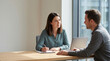 © zabhie - Professional woman conducting job interview with male candidate in office, HR manager listening to employee during performance review, business meeting and career consultation concept