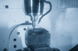 © Pixel_B - High-precision 5-axis CNC milling machine finishing a press die part with a ball nose end mill.