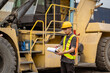© NINENII - Engineers Inspect Cargo Shipment at Container Yard, Logistics Concept.