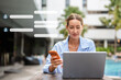© NINENII - Woman uses artificial intelligence chatbots automatically respond online messages to help customers instantly.