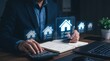 © Eve - Professional man calculating mortgage rates for home purchase. Financial planning for real estate investment, property loan calculator and house budget management at office desk.