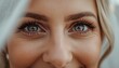 © geniuskp - There is a close up of a woman ' s face with a veil over her head