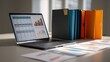 © backup_studio - Laptop with financial data charts and folders on office desk. Business accounting report analysis, statistics and corporate project planning. Digital marketing strategy and economy concept.