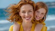 © Nataliia_Trushchenko - Caucasian woman with long red hair smiles while carrying a young girl with red hair on her back at a beach with ocean waves in the background