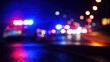© Alamin - Blurry police car lights at night on wet road abstract background with bokeh effect and red blue reflections.