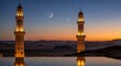 © G_Kawi - Vue du soir de deux minarets avec un croissant de lune dans un paysage paisible