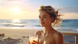 Woman enjoying beach cocktail sunset