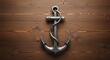 © tembok - Vintage Metal Anchor on Wooden Background.