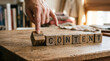 © Anissa - Human hand wooden block ai content anti ai content table finger human