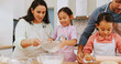 © peopleimages.com - Happy, family and baking with children in kitchen, growth and learning culinary skills with parents. Teaching, kids and help with dessert preparation, development and people with ingredients in house