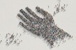 © j  U  N  U - Large crowd of people forming a giant hand shape from an aerial view