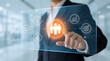 © ShahabudinKhan - Businessman interacts with virtual interface touching human icon representing teamwork and communication in a professional setting with technology