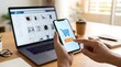 © AH Project - Person using smartphone with buy now button for online shopping next to laptop