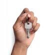 © Anda - Hand holding a single silver key on a white background
