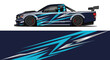 © AhzaArdiansyah - Blue and white race car with bold graphic livery and streamlined design.