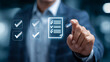 © suldev - Businessman showing online document validation icon, quality assessment management With a checklist, business document evaluation process.