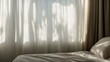 © Vaundy - mattress. Serene bedroom bathed in morning sunlight streaming through sheer curtains, highlighting plush neutral-toned bedding. lifestyle magazines.