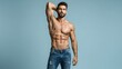 © BeHai - Muscular Man Posing Revealing Physique Against Studio Backdrop