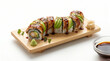 © Kumuthini - Caterpillar sushi roll served on a wooden board isolated on a transparent background.