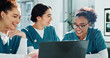 © peopleimages.com - Nurses, laugh and meeting in hospital with laptop, discussion and funny joke for medical research. Healthcare worker, people and happy in clinic with computer, humor or planning together for schedule