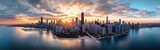 Aerial panoramic view of chicago skyline along lake michigan at sunrise with tall skyscrapers, calm reflective water, dramatic clouds and a warm, serene, awe-inspiring glow