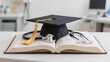 © iMDStock - Graduation Cap with Stethoscope and Medical Textbook
