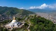 © Nantaporn - Majestic Stupa at Boudhanath with Panoramic View of Kathmandu Valley under Clear Blue Sky