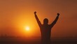 © Andrii - Celebrating Success At Sunrise: Vintage Silhouette Of A Victorious Man With Arm Up Achieving Great Accomplishments.