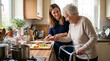 © Cla78 - Young caregiver helping elderly woman with walker prepare vegetables in kitchen home care assistance