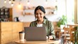 © april7544 - young woman working on laptop
