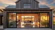 © Chainarong - Converted old wooden barn into modern living space with large sliding doors at sunset in rural landscape