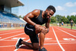 © Meow Creations - Athletic young man pausing on a running track while experiencing severe knee discomfort