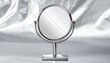 © Tewel - elegant round vanity mirror on silver stand minimalist reflection close-up