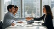 © Bali Adventure Co - Business deal success handshake between professionals in modern office