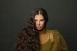 © millaf (Nemchinova) - Long hair. Beautiful model with long curly hairstyle posing