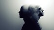 © NingPhattraphorn - Silhouettes of two heads facing opposite directions, one solid and the other fading into smoke, duality and inner conflict, ai co-creator abstract background