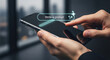 © DA_STOCK - Person using smartphone to write AI prompt in futuristic digital interface