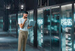 © Rendara Studio - 3D server analysis laptop with technician in secure data hall