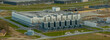 © Moldova-Film - Large-scale data center facility with cooling units, robust power system, and interconnected pipelines that ensure optimal server performance. Digital storage and scalable cloud computing environment.