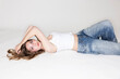 © MACO - Studio portrait of young beautiful woman.