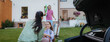 © Halfpoint - Family loading car and preparing for summer vacation.